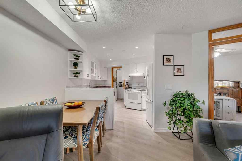 MLS® A2268126 - Unit #122 7229 Sierra Morena Boulevard SW in Signal Hill Calgary, Residential