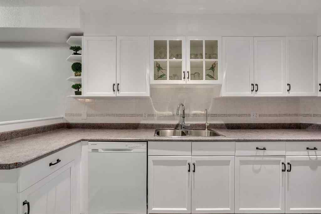 MLS® A2268126 - Unit #122 7229 Sierra Morena Boulevard SW in Signal Hill Calgary, Residential