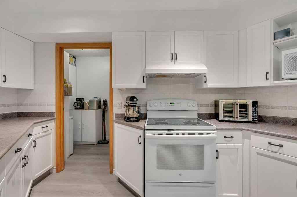 MLS® A2268126 - Unit #122 7229 Sierra Morena Boulevard SW in Signal Hill Calgary, Residential