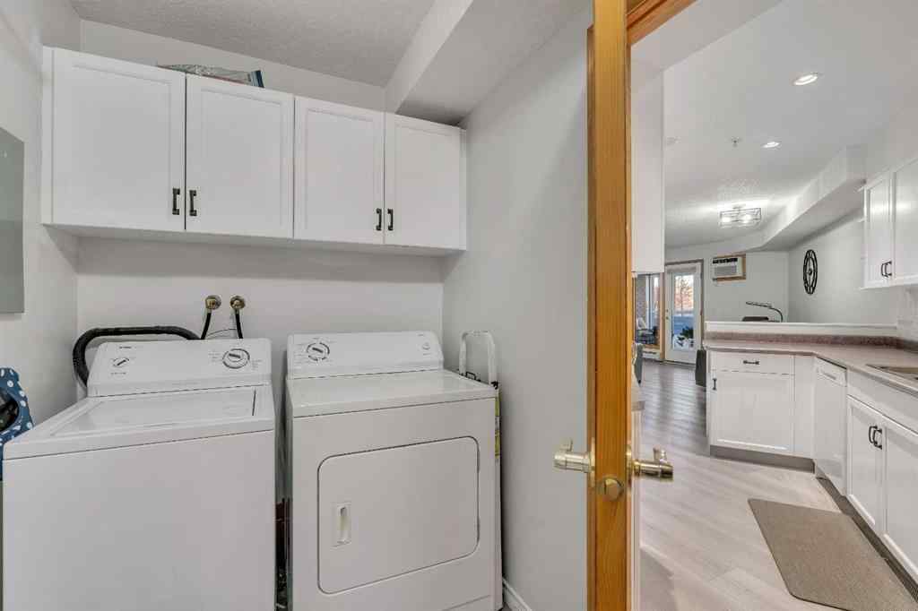 MLS® A2268126 - Unit #122 7229 Sierra Morena Boulevard SW in Signal Hill Calgary, Residential