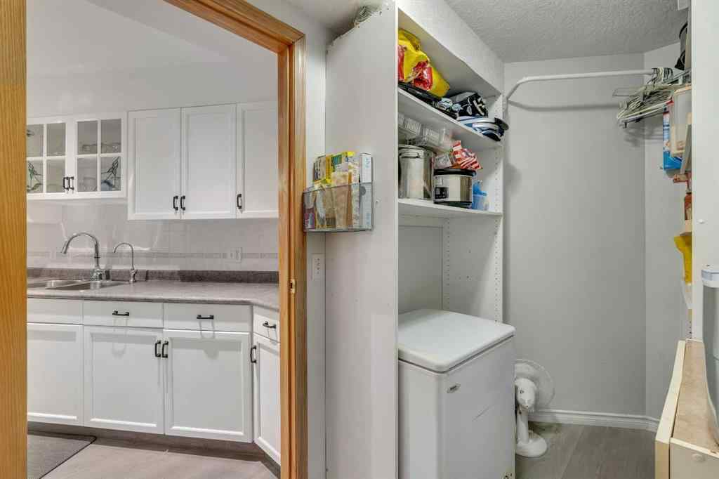 MLS® A2268126 - Unit #122 7229 Sierra Morena Boulevard SW in Signal Hill Calgary, Residential