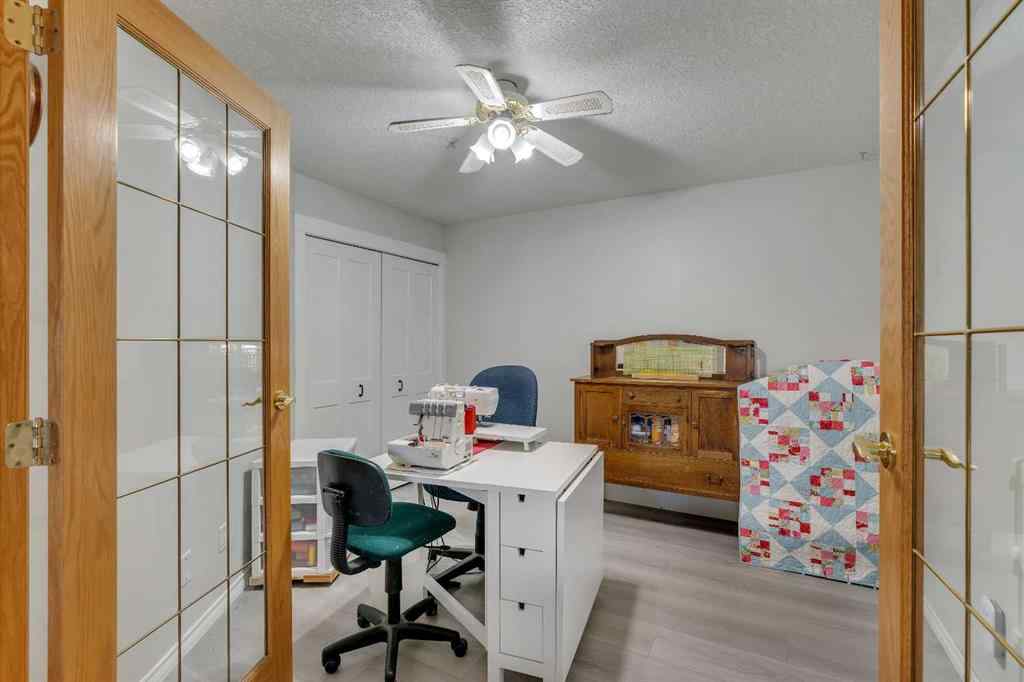 MLS® A2268126 - Unit #122 7229 Sierra Morena Boulevard SW in Signal Hill Calgary, Residential