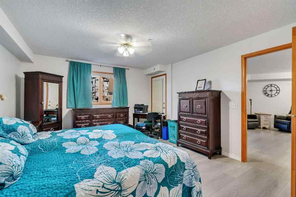 MLS® A2268126 - Unit #122 7229 Sierra Morena Boulevard SW in Signal Hill Calgary, Residential