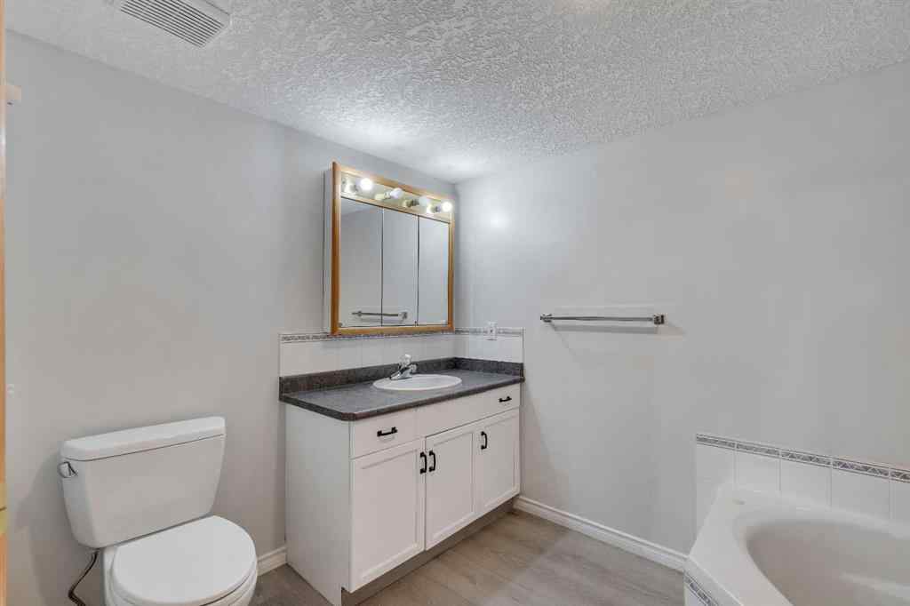 MLS® A2268126 - Unit #122 7229 Sierra Morena Boulevard SW in Signal Hill Calgary, Residential