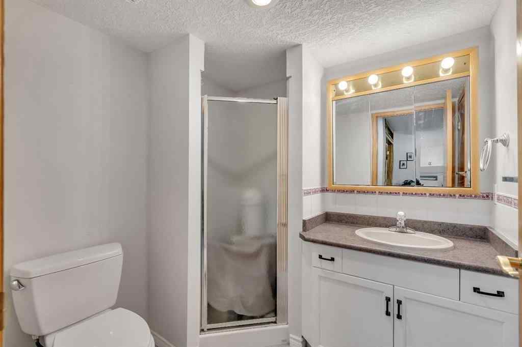 MLS® A2268126 - Unit #122 7229 Sierra Morena Boulevard SW in Signal Hill Calgary, Residential