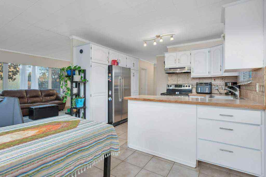 MLS&reg; # A2268137 - 5702 West Park Crescent  in West Park Red Deer, Residential Open Houses