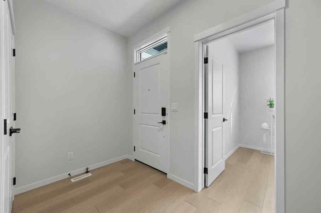 MLS® A2268142 - 51 Herron Street NE in Livingston Calgary, Residential