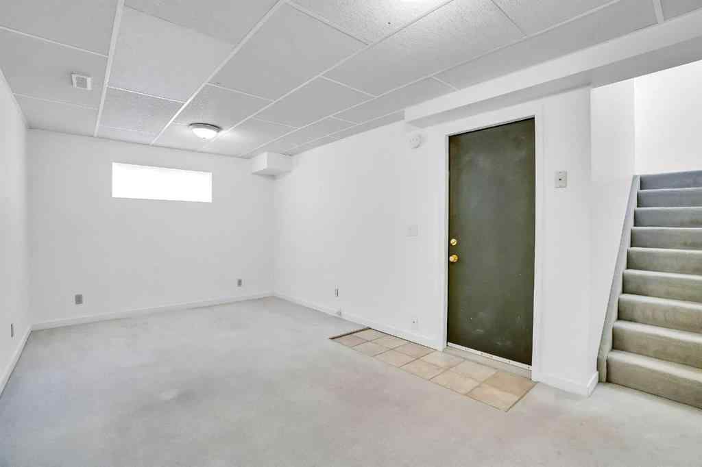 MLS® A2268173 - 209 Patina Park SW in Patterson Calgary, Residential