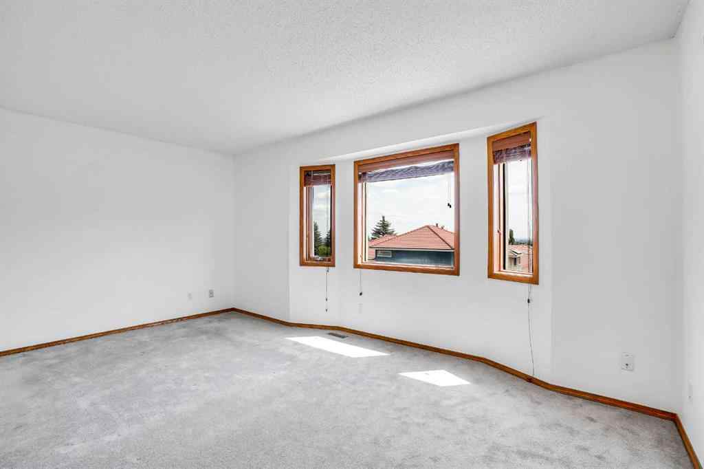 MLS® A2268173 - 209 Patina Park SW in Patterson Calgary, Residential