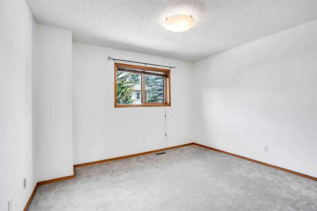 MLS® A2268173 - 209 Patina Park SW in Patterson Calgary, Residential