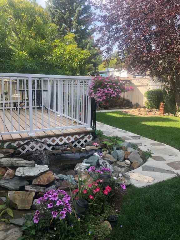 MLS® A2268185 - 97 Downey Road  in Downey Ridge Okotoks, Residential