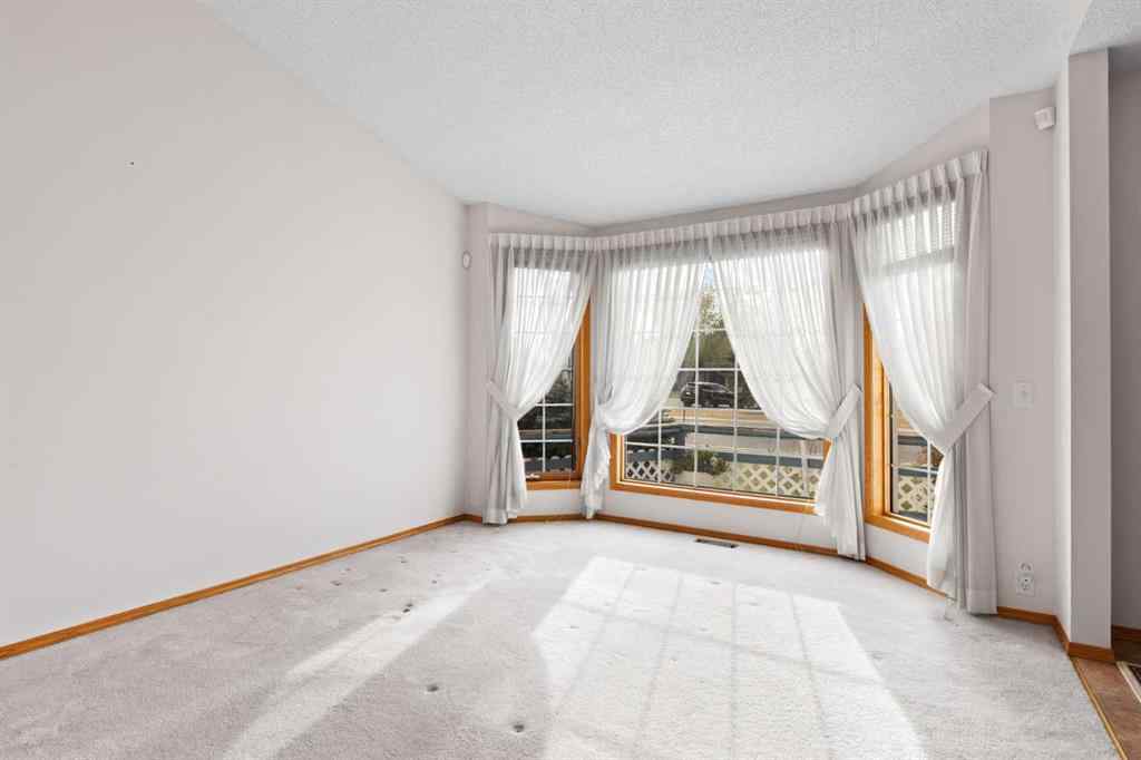 MLS® A2268185 - 97 Downey Road  in Downey Ridge Okotoks, Residential