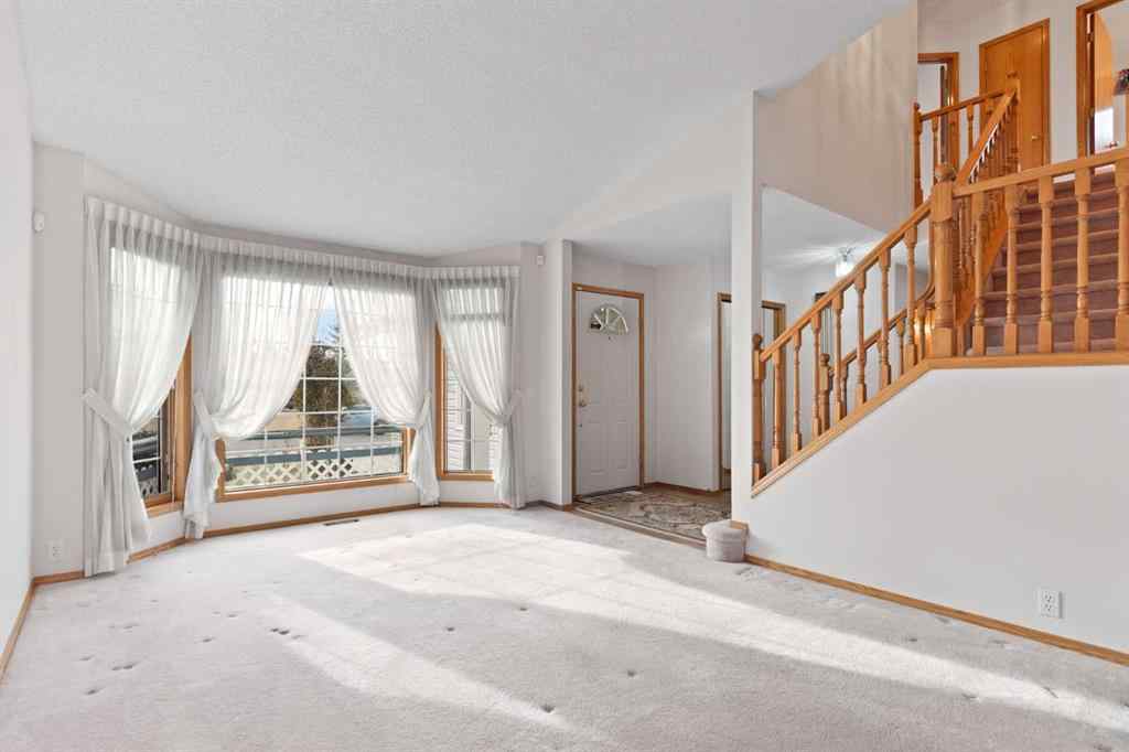 MLS® A2268185 - 97 Downey Road  in Downey Ridge Okotoks, Residential