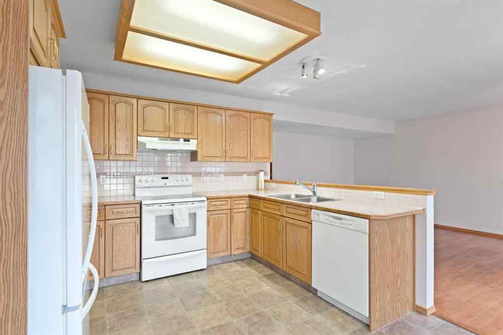 MLS® A2268185 - 97 Downey Road  in Downey Ridge Okotoks, Residential