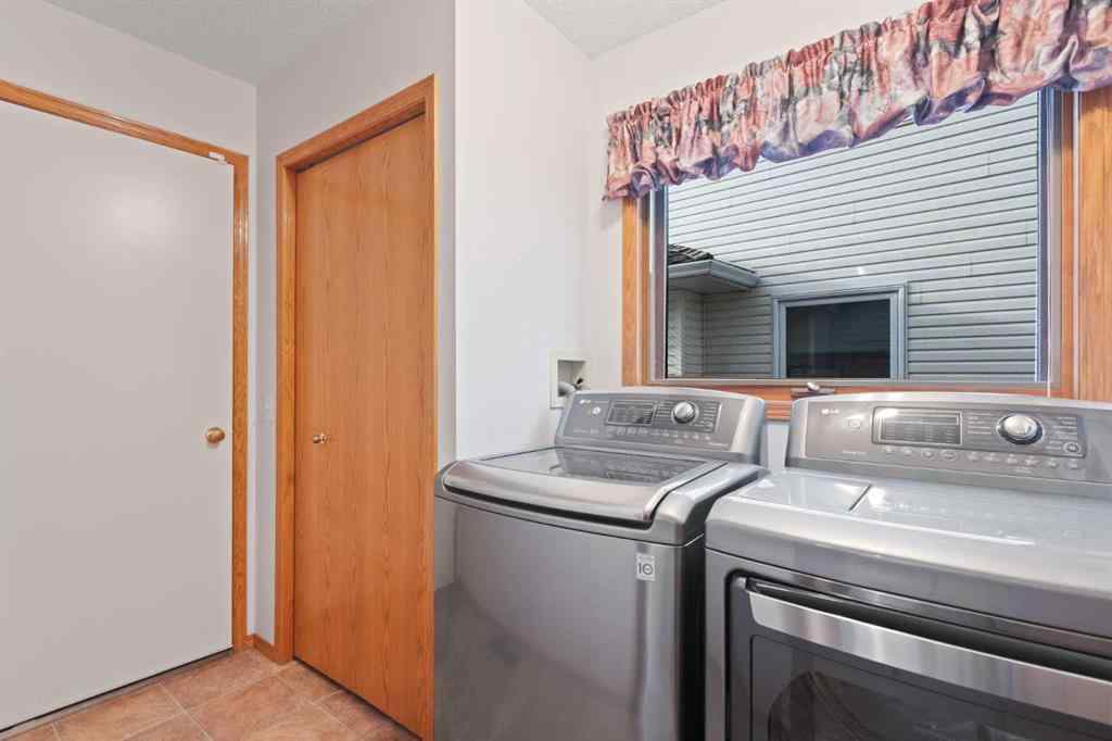 MLS® A2268185 - 97 Downey Road  in Downey Ridge Okotoks, Residential