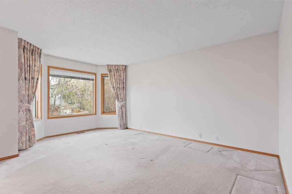 MLS® A2268185 - 97 Downey Road  in Downey Ridge Okotoks, Residential