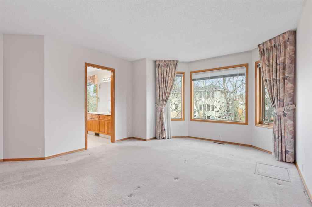 MLS® A2268185 - 97 Downey Road  in Downey Ridge Okotoks, Residential