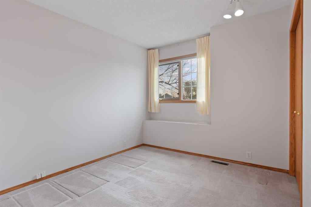 MLS® A2268185 - 97 Downey Road  in Downey Ridge Okotoks, Residential