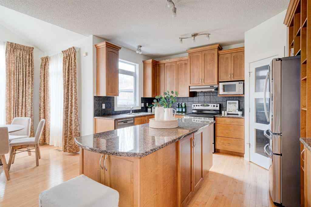 MLS® A2268187 - 108 Tuscany Estates Close NW in Tuscany Calgary, Residential