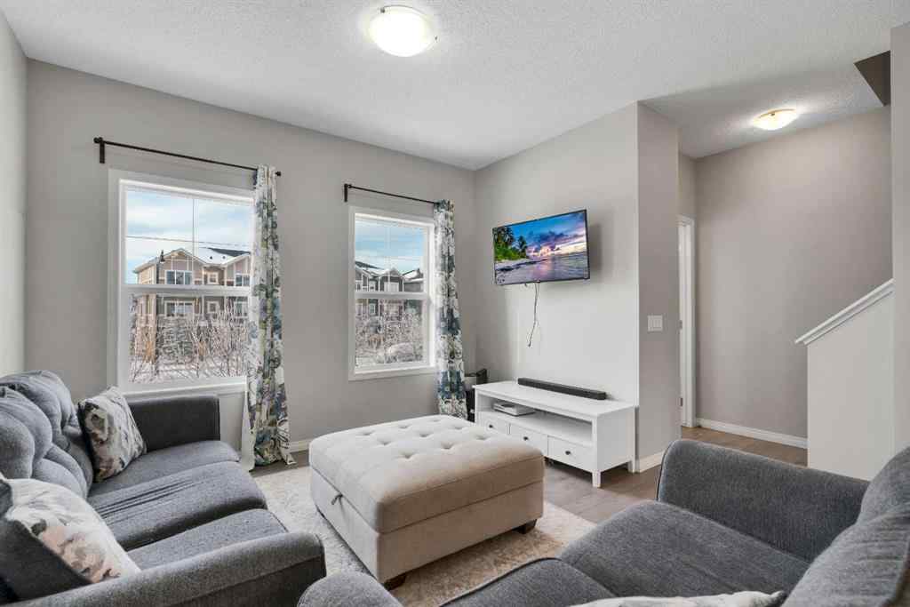 MLS® A2268215 - 140 Sundown Road  in Sunset Ridge Cochrane, Residential