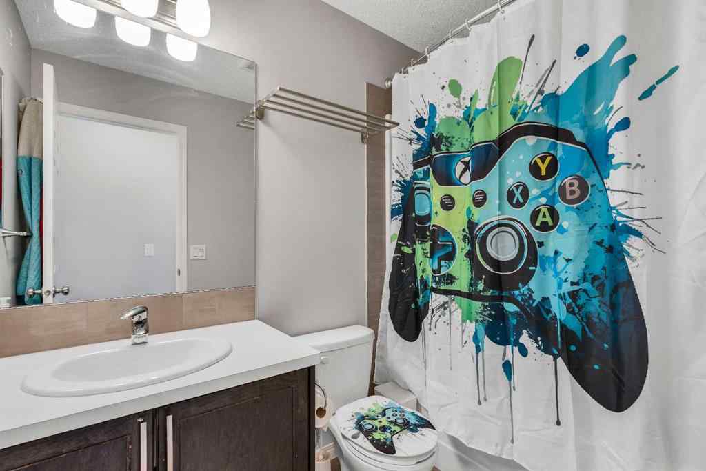 MLS® A2268215 - 140 Sundown Road  in Sunset Ridge Cochrane, Residential