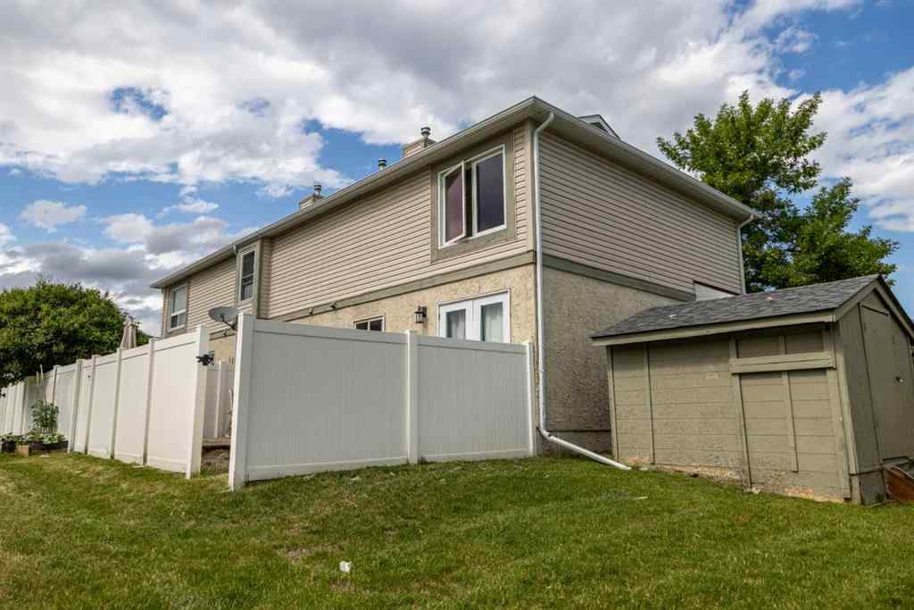 MLS® A2268225 - 105 Deer Ridge Lane SE in Deer Run Calgary, Residential