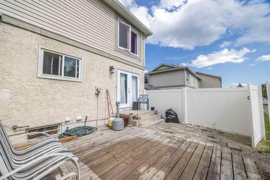 MLS® A2268225 - 105 Deer Ridge Lane SE in Deer Run Calgary, Residential