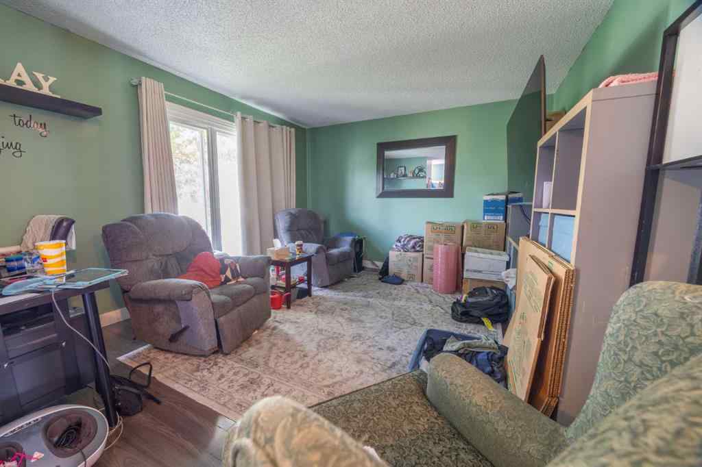 MLS® A2268225 - 105 Deer Ridge Lane SE in Deer Run Calgary, Residential