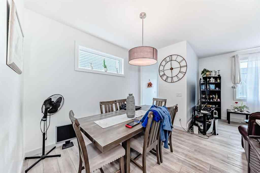 MLS® A2268237 - 116 Ambleton Street NW in Moraine Calgary, Residential