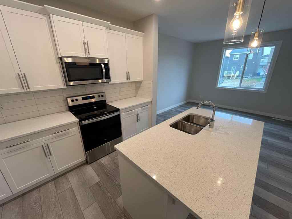 MLS® A2268239 - 112 Ambleton Street NW in Moraine Calgary, Residential