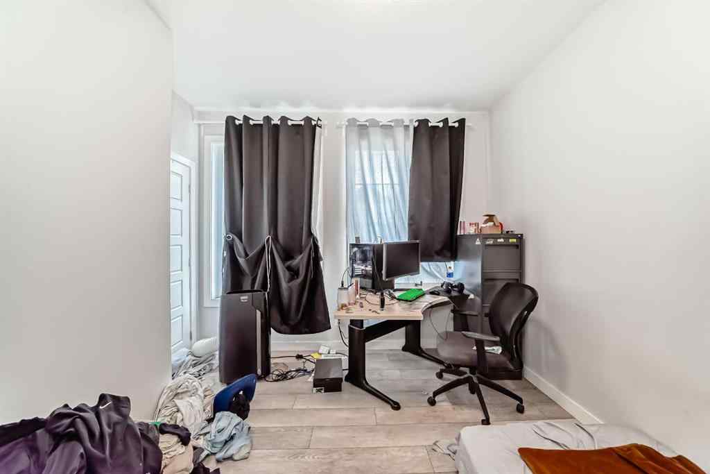 MLS® A2268239 - 112 Ambleton Street NW in Moraine Calgary, Residential