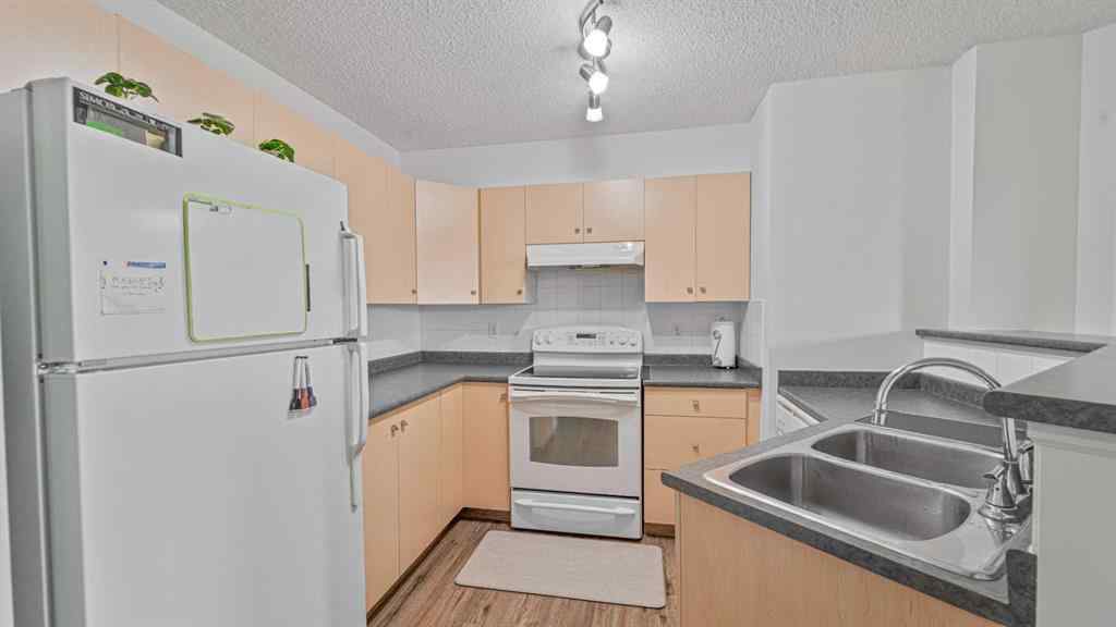 MLS® A2268251 - Unit #105 17 Country Village Bay NE in Country Hills Village Calgary, Residential