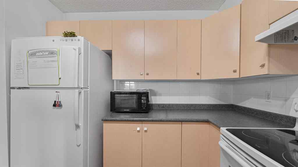 MLS® A2268251 - Unit #105 17 Country Village Bay NE in Country Hills Village Calgary, Residential