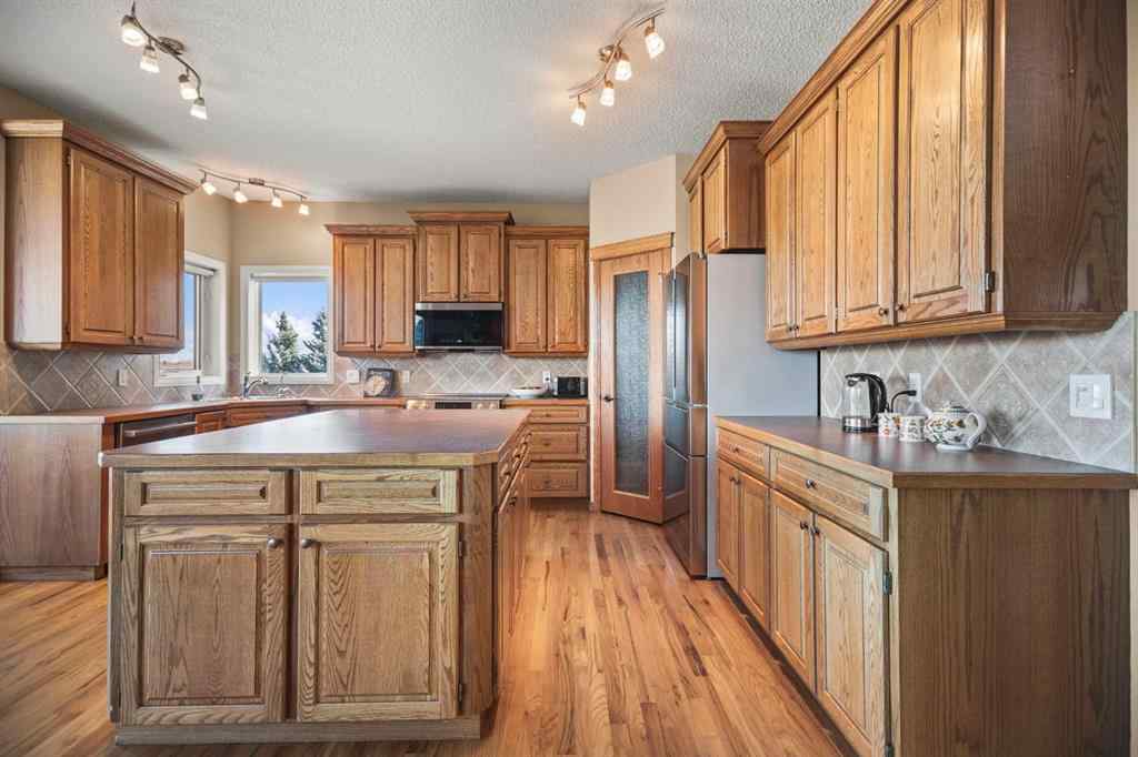 MLS® A2268254 - 50 Sheep River Crescent  in Sheep River Ridge Okotoks, Residential