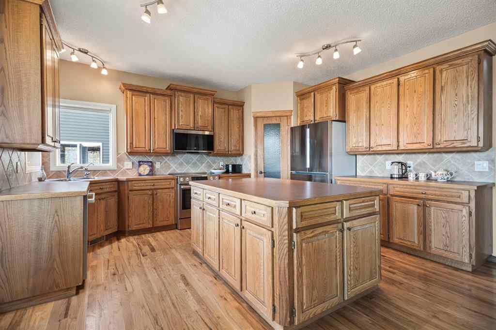 MLS® A2268254 - 50 Sheep River Crescent  in Sheep River Ridge Okotoks, Residential