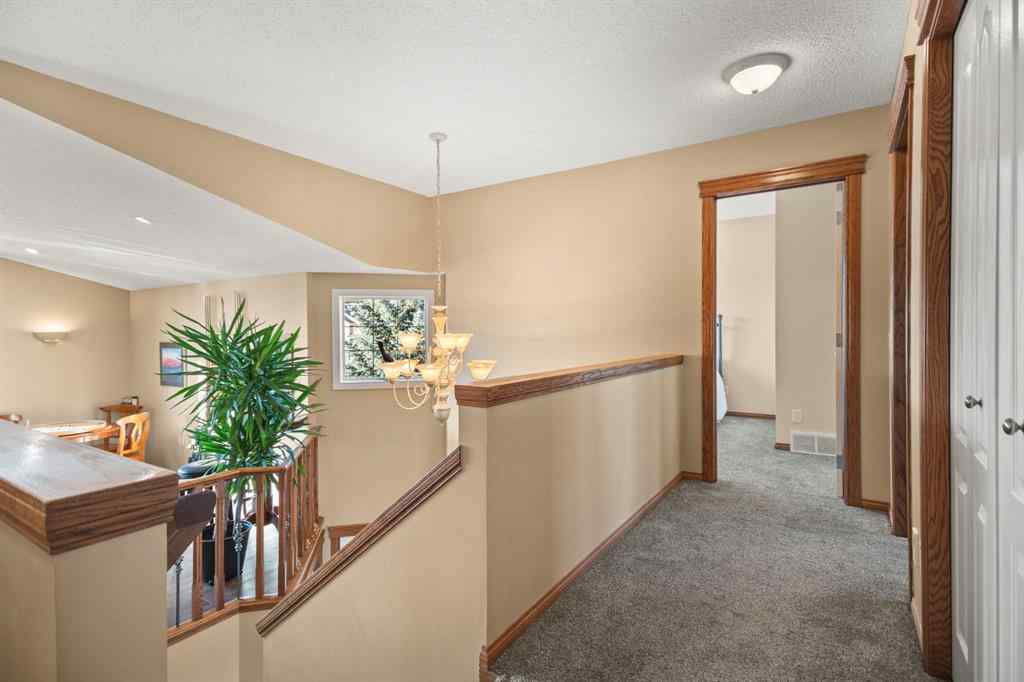 MLS® A2268254 - 50 Sheep River Crescent  in Sheep River Ridge Okotoks, Residential