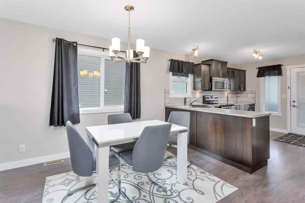 MLS&reg; # A2268257 - 23 Hampton Crescent  in Hampton Pointe Sylvan Lake, Residential Open Houses