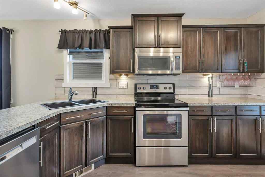 MLS&reg; # A2268257 - 23 Hampton Crescent  in Hampton Pointe Sylvan Lake, Residential Open Houses