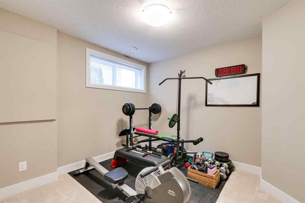 MLS® A2268287 - 1719 Woodside Boulevard NW in Woodside Airdrie, Residential