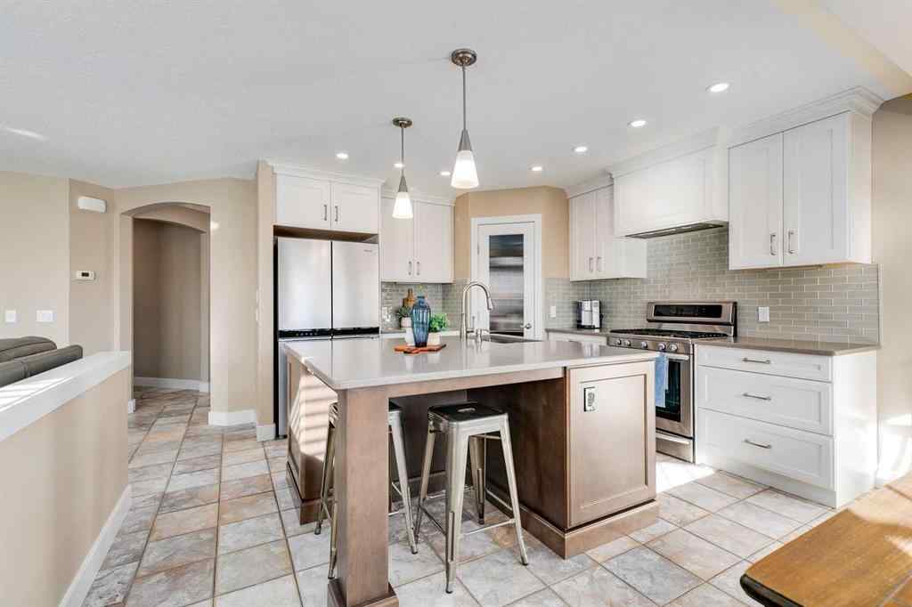 MLS® A2268287 - 1719 Woodside Boulevard NW in Woodside Airdrie, Residential