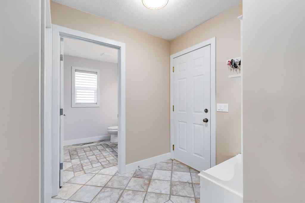 MLS® A2268287 - 1719 Woodside Boulevard NW in Woodside Airdrie, Residential