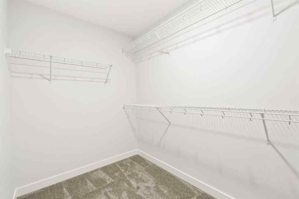 MLS® A2268293 - 152 Creekstone Circle SW in Pine Creek Calgary, Residential