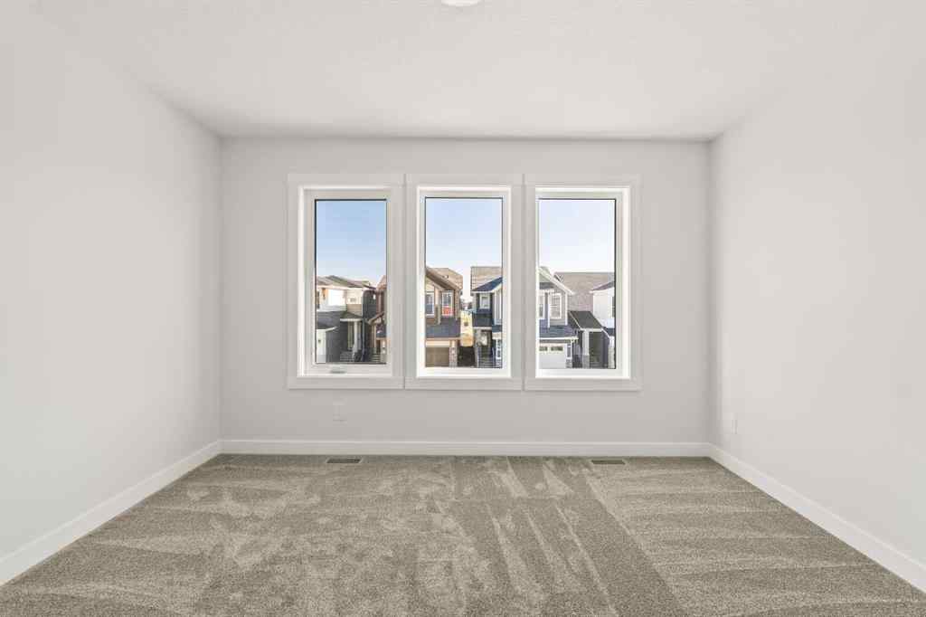 MLS® A2268293 - 152 Creekstone Circle SW in Pine Creek Calgary, Residential