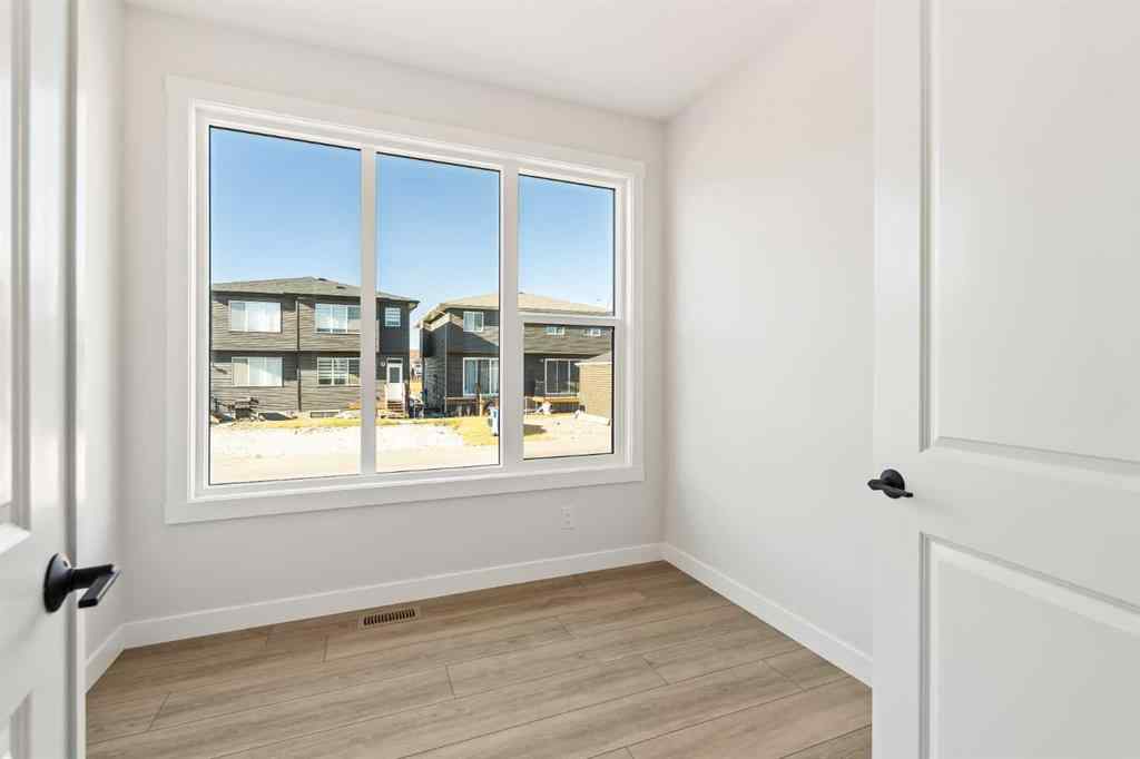 MLS® A2268293 - 152 Creekstone Circle SW in Pine Creek Calgary, Residential