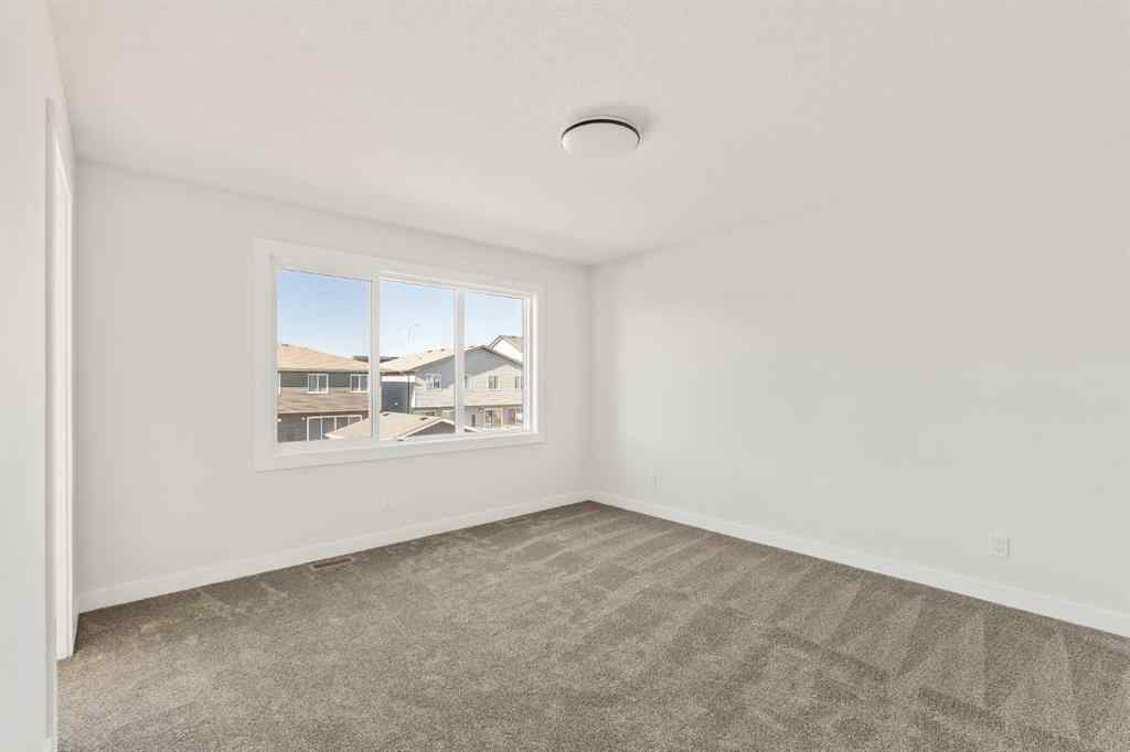 MLS® A2268293 - 152 Creekstone Circle SW in Pine Creek Calgary, Residential