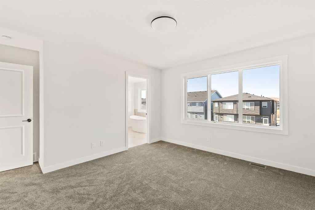 MLS® A2268293 - 152 Creekstone Circle SW in Pine Creek Calgary, Residential