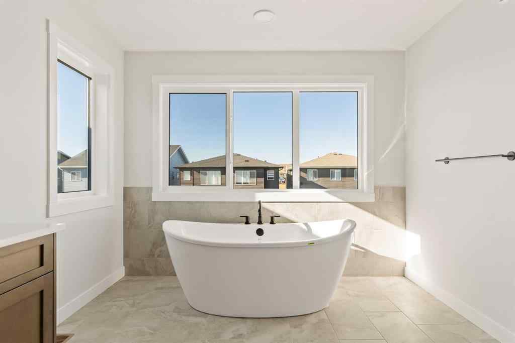 MLS® A2268293 - 152 Creekstone Circle SW in Pine Creek Calgary, Residential