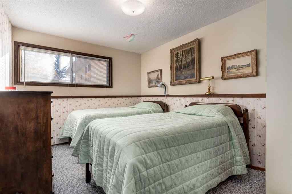 MLS® A2268316 - 1623 111 Avenue SW in Braeside Calgary, Residential
