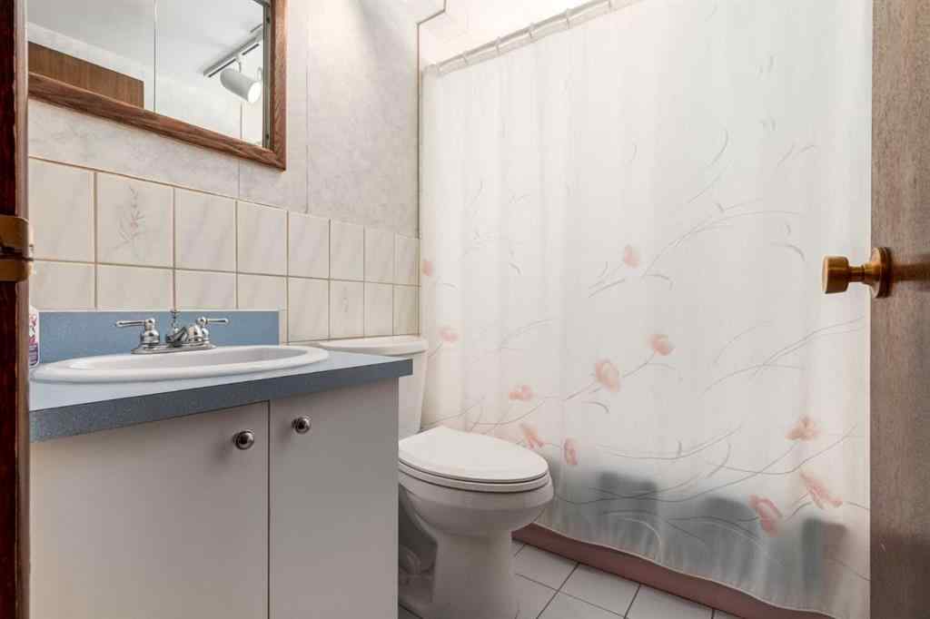 MLS® A2268316 - 1623 111 Avenue SW in Braeside Calgary, Residential