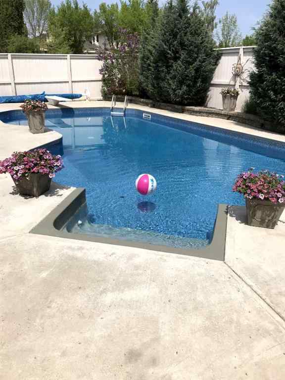 MLS&reg; # A2268320 - 6 Mt Yamnuska Court SE in McKenzie Lake Calgary, Residential Open Houses